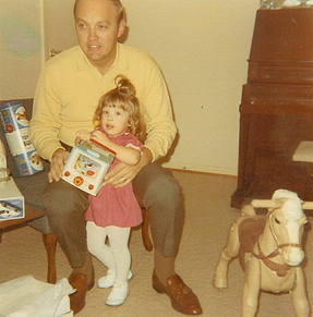 Albert Corbin with young daughter with presents